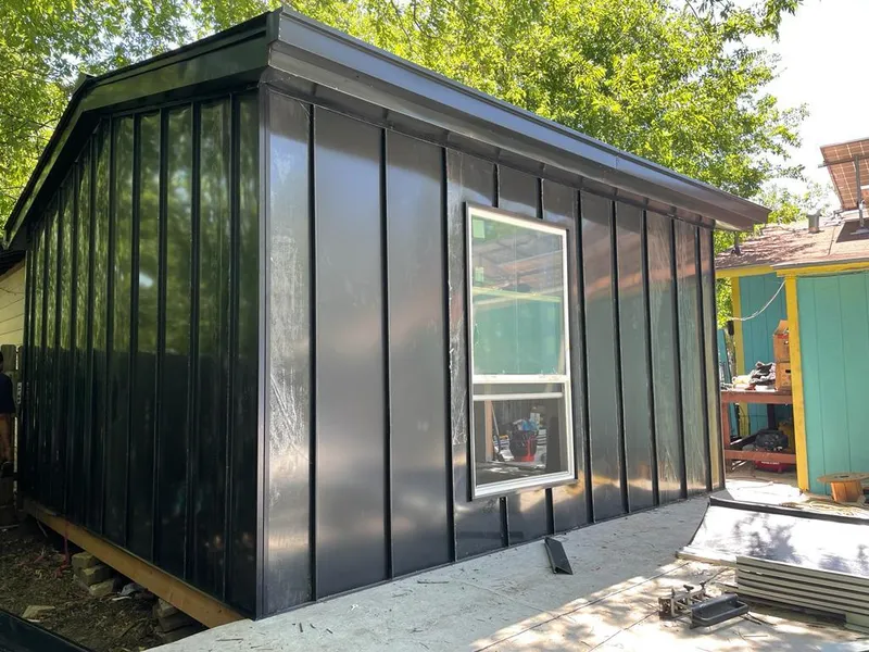 Black standing seam metal wall panels for Metal Roof Installation in Cranston