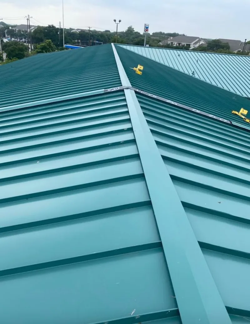 Green commercial metal roof ridge and valley for Metal Roof Repair in Cranston