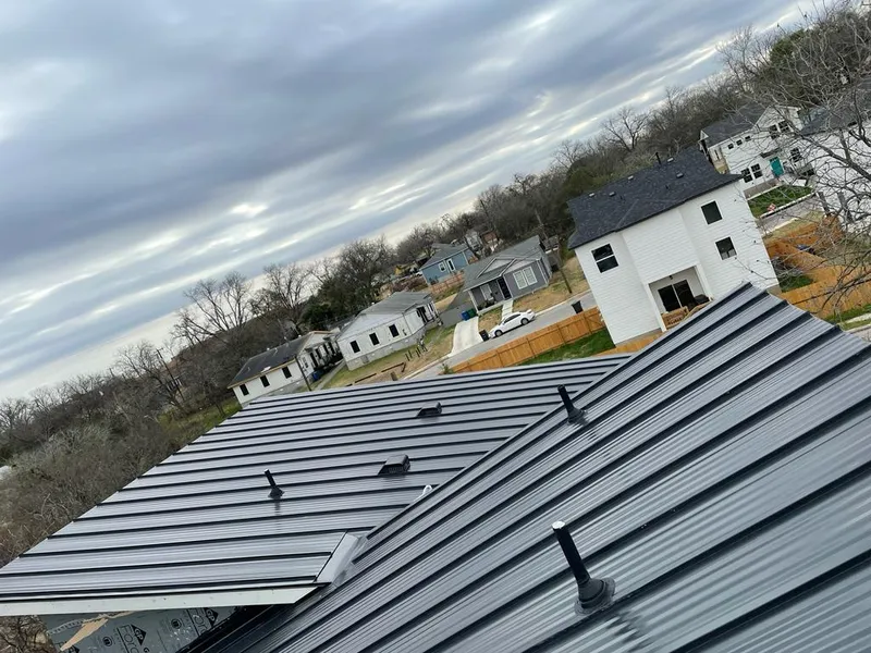 Standing seam metal roof panels with vents for Skylight Repair in Cranston